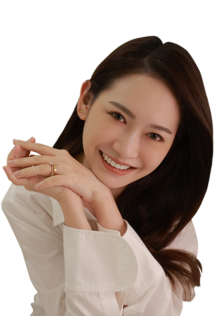 A girl smiling with her teeth showing, wearing clear aligners.